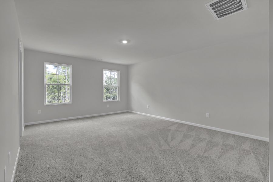 Spacious, unfurnished interior of a new home in River Tide Farms, Bolivia (Image 18).