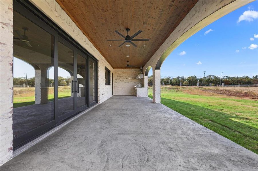 View of patio / terrace featuring ceiling fan