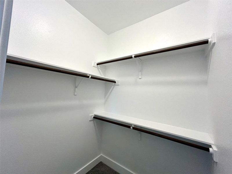First small bedroom walk-in closet. First small bedroom walk-in closet.
