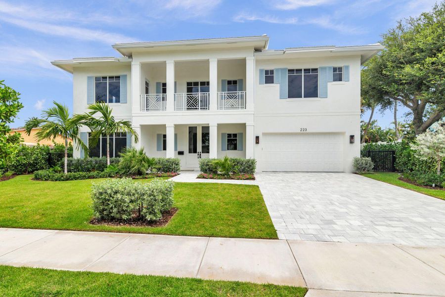 Front exterior of a new home in , West Palm Beach, FL, highlighting curb appeal (Image 1). Front exterior of a new home in , West Palm Beach, FL, highlighting curb appeal (Image 1).