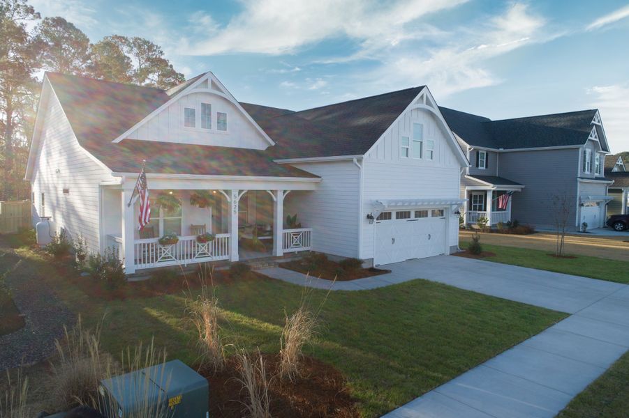 Representative exterior photo of a completed home built from the Ashton by Bill Clark Homes in Osprey Landing, Southport, NC (Image 24). Representative exterior photo of a completed home built from the Ashton by Bill Clark Homes in Osprey Landing, Southport, NC (Image 24).