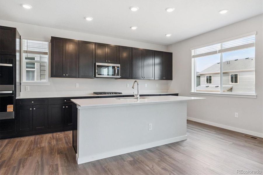 Furnished interior view inside a new home in Floret Collection at Alder Creek, Parker (Image 5).