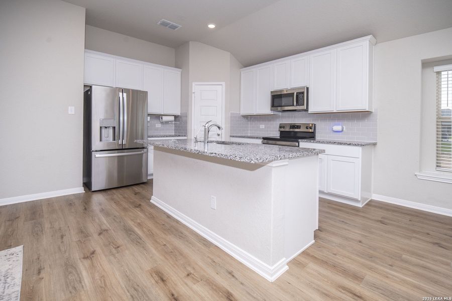 Furnished interior view inside a new home in Summer Hills, San Antonio (Image 6).