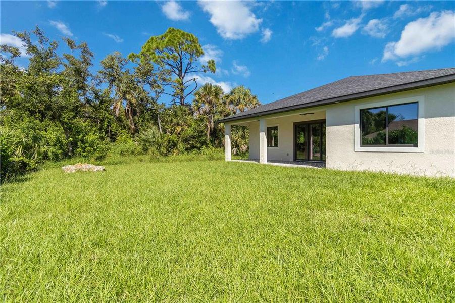 Front exterior of a new home in , Rotonda West, FL, highlighting curb appeal (Image 19).