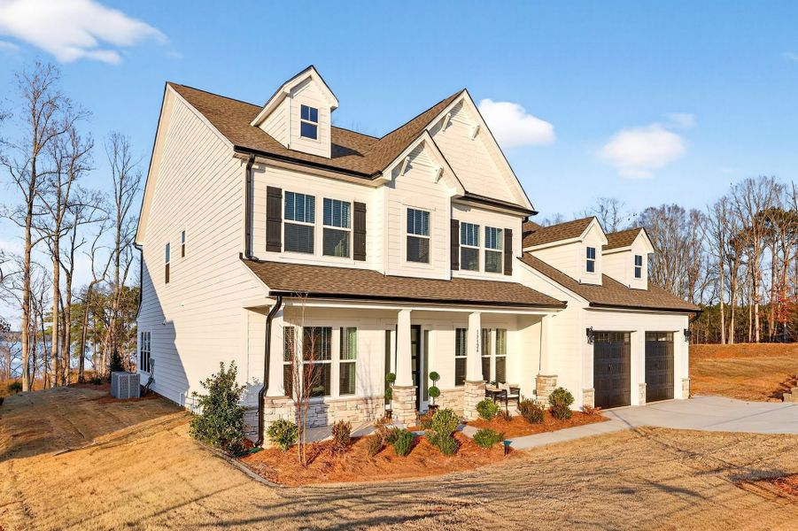 Front exterior of a new home in Edgewater - Harbor Pointe, Lancaster, SC, highlighting curb appeal (Image 1). Front exterior of a new home in Edgewater - Harbor Pointe, Lancaster, SC, highlighting curb appeal (Image 1).