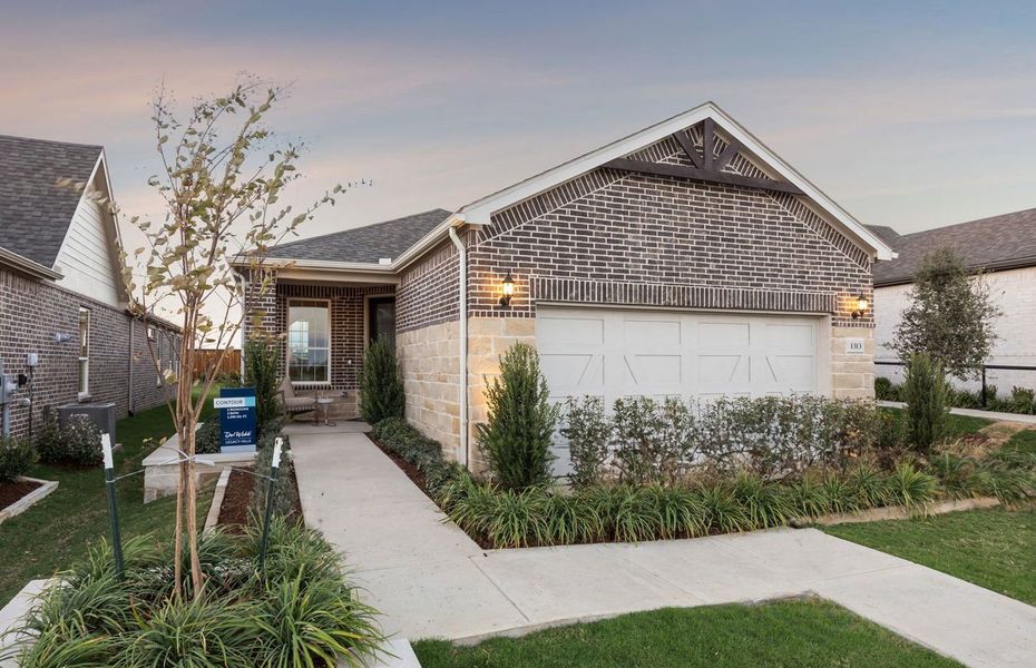 Front exterior of a new home in Del Webb at Legacy Hills, Celina, TX, highlighting curb appeal (Image 20).
