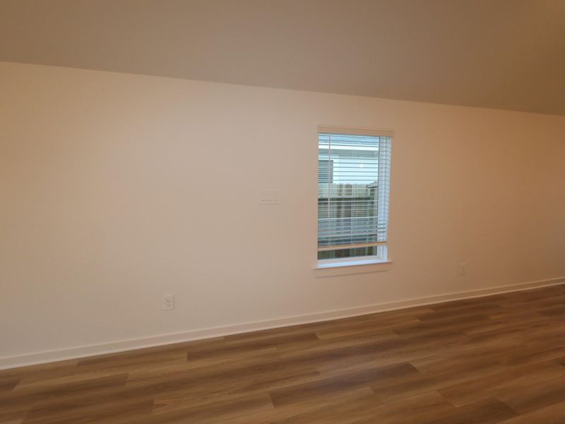 Spacious, unfurnished interior of a new home in Pinewood at Grand Texas, New Caney (Image 13).