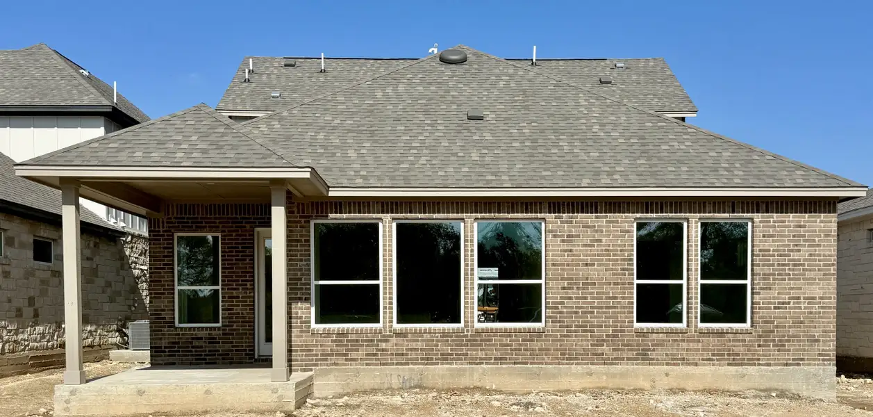Exterior details and patio area of a home in Persimmon, Buda (Image 4). Exterior details and patio area of a home in Persimmon, Buda (Image 4).