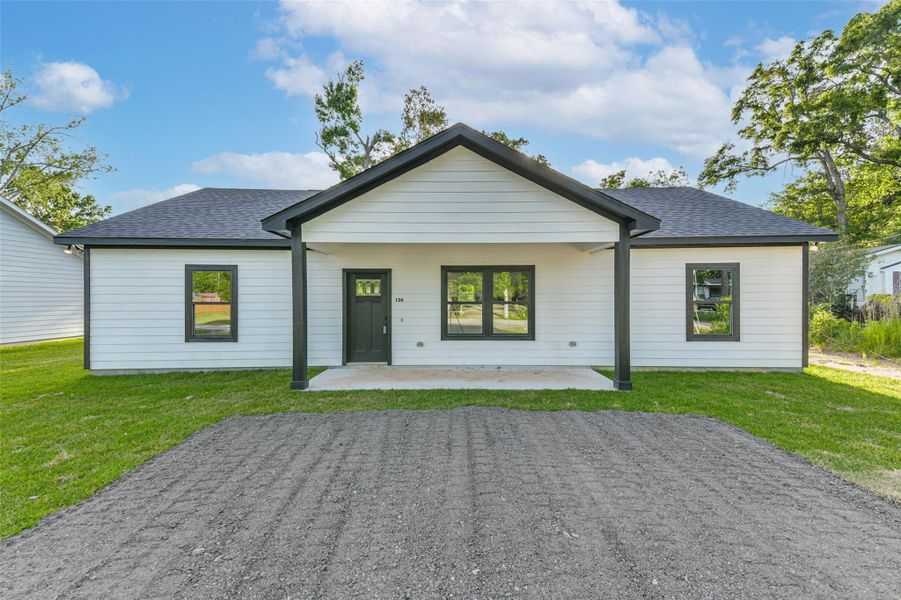 Front exterior of a new home in , Splendora, TX, highlighting curb appeal (Image 2). Front exterior of a new home in , Splendora, TX, highlighting curb appeal (Image 2).