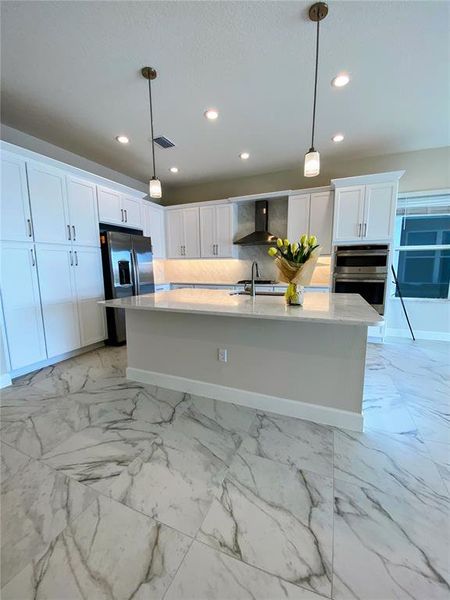Furnished interior view inside a new home in Valencia Ridge (55+), Wesley Chapel (Image 7).