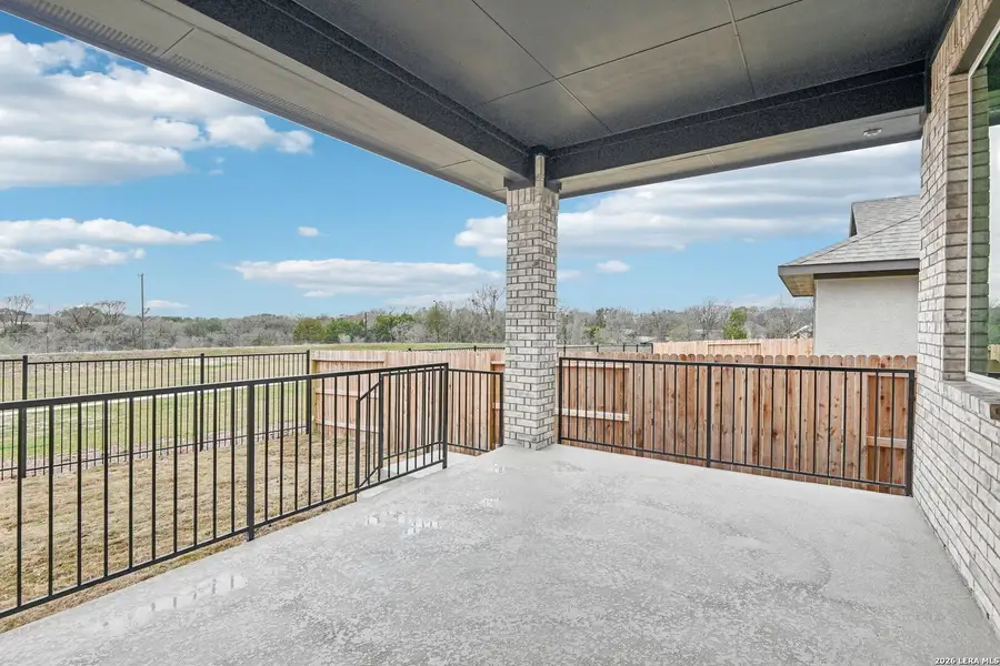 Exterior details and patio area of a home in Village at Three Oaks, Seguin (Image 20). Exterior details and patio area of a home in Village at Three Oaks, Seguin (Image 20).