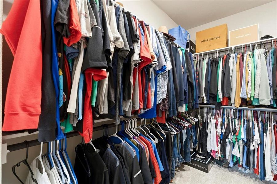 Primary bedroom closet is HUGE Primary bedroom closet is HUGE