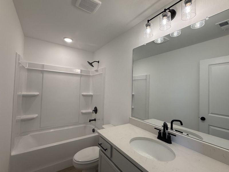 Furnished interior view inside a new home in Nexus Townhomes, Gallatin (Image 6).