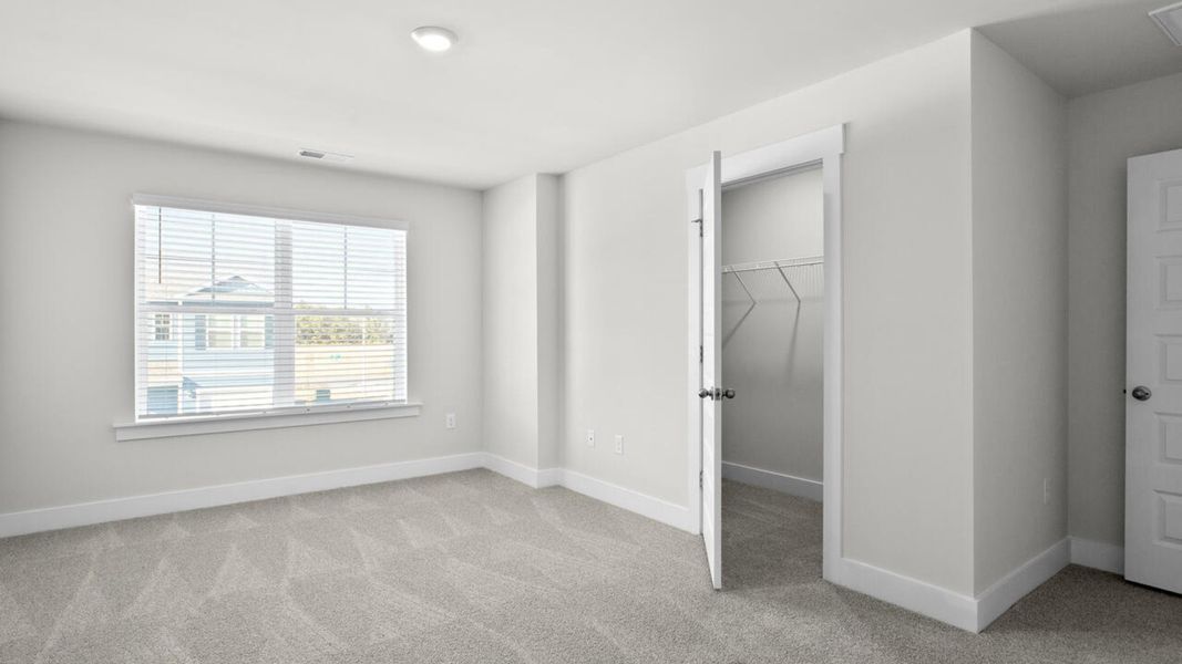 Spacious, unfurnished interior of a new home in Indigo Preserve Townhomes, Leland (Image 19).