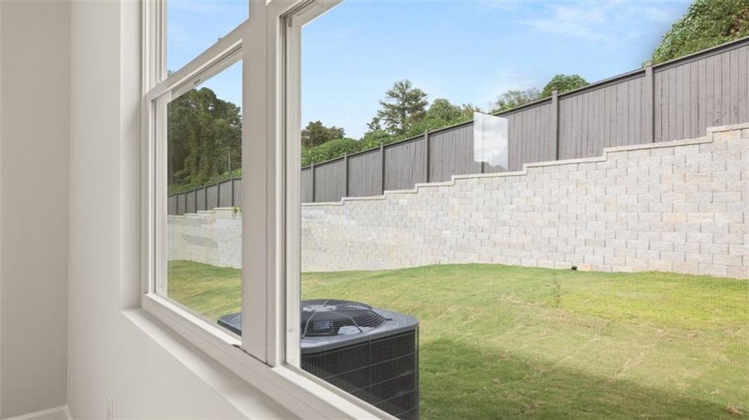 Exterior details and patio area of a home in Kingston Ranch at Lake Oconee, Buckhead (Image 17).