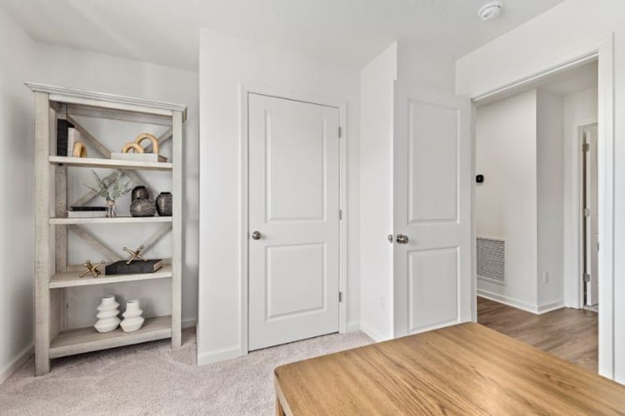 A room with white doors.