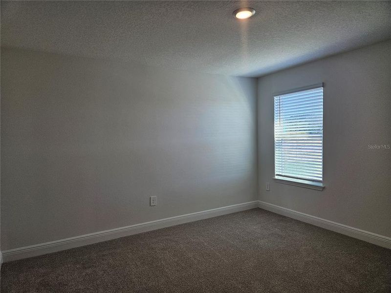 Spacious, unfurnished interior of a new home in The Reserve at Hammock Oaks - Classic Series, Lady Lake (Image 41).