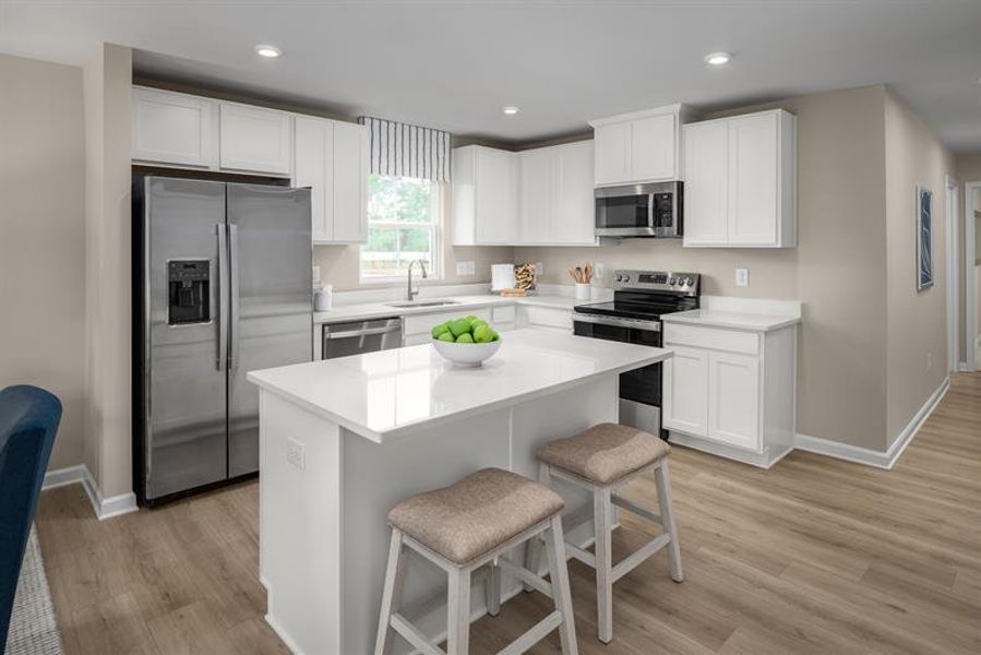 Furnished interior view inside a new home in Highland Park Condos, White House (Image 1). Furnished interior view inside a new home in Highland Park Condos, White House (Image 1).