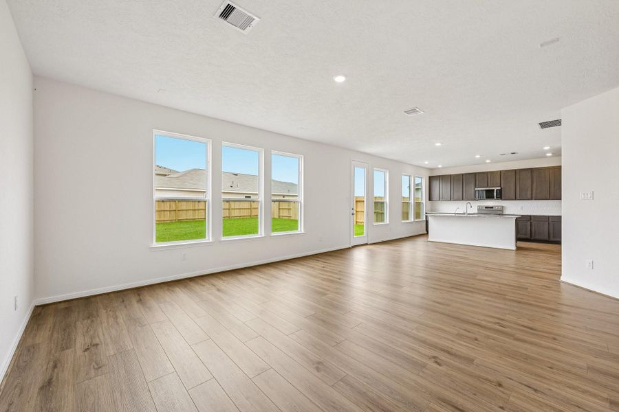 An entertainer’s dream! The expansive, open-concept main floor flows beautifully from room to room, keeping you connected to guests whether you're cooking in the kitchen or relaxing in the living room.