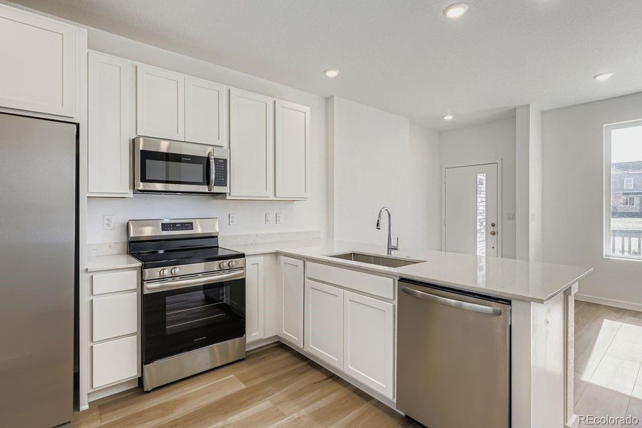 Furnished interior view inside a new home in Parterre: The Parkside Collection, Thornton (Image 4).