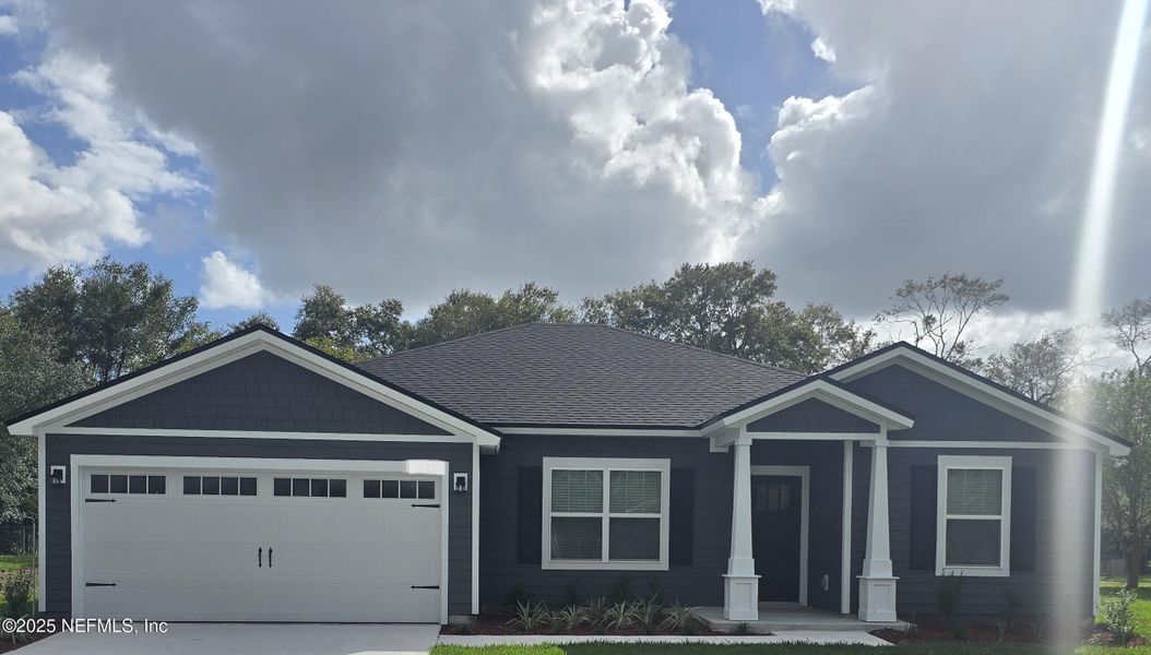 Front exterior of a new home in , Jacksonville, FL, highlighting curb appeal (Image 1). Front exterior of a new home in , Jacksonville, FL, highlighting curb appeal (Image 1).
