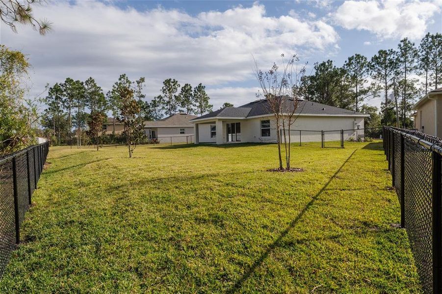 Exterior details and patio area of a home in , Palm Coast (Image 21).