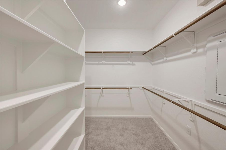 Large walk-in closet in the owner's suite (*Photo not of actual home and used for illustration purposes only.)