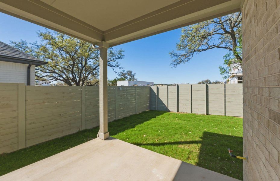 Exterior details and patio area of a home in Wolf Ranch, Georgetown (Image 4).