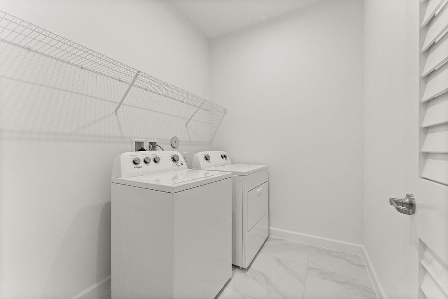 Furnished interior view inside a new home in Tradition - Cadence, Port St. Lucie (Image 3).