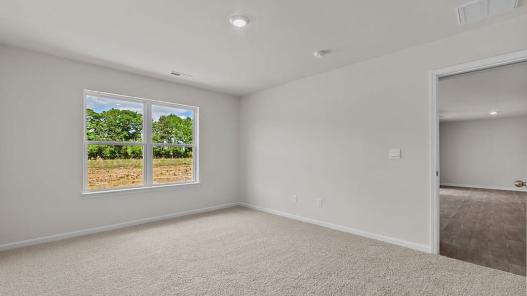 Representative unfurnished interior of a home built from the Cali by D.R. Horton in Hobbs Farm, Ayden (Image 27).