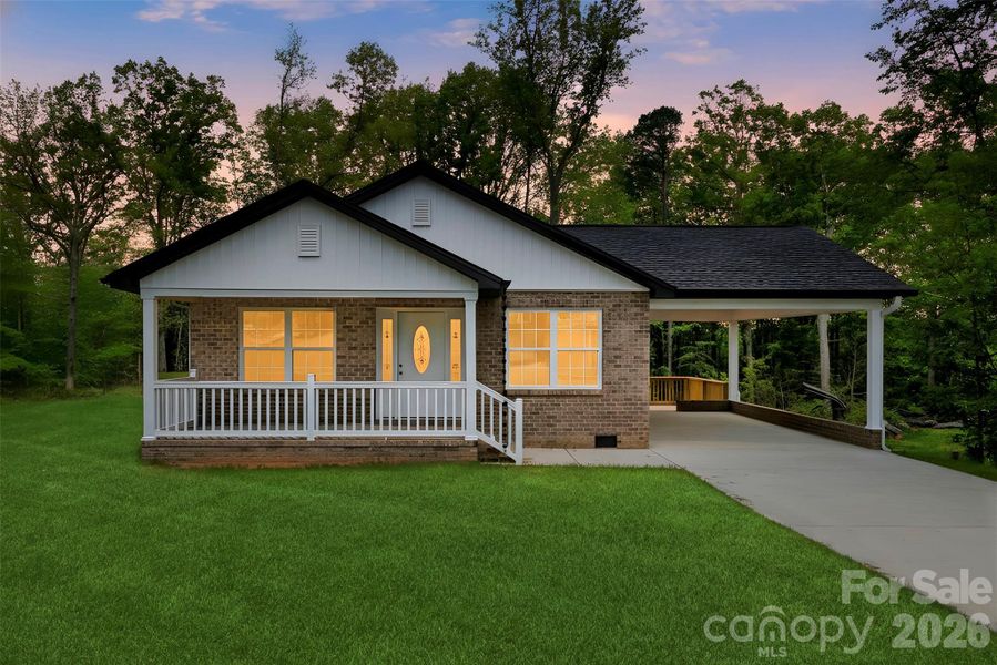 Front exterior of a new home in , Bessemer City, NC, highlighting curb appeal (Image 15).