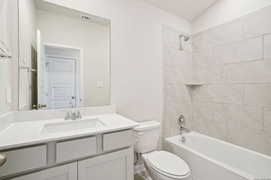 Furnished interior view inside a new home in Legendary Trails - Premier Series, Cibolo (Image 8).