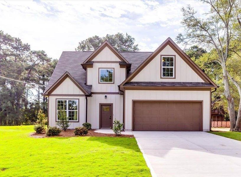 Front exterior of a new home in , Conyers, GA, highlighting curb appeal (Image 1).
