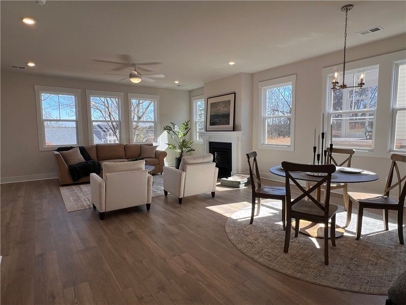 Bright and open living area features a dining spac Bright and open living area features a dining spac