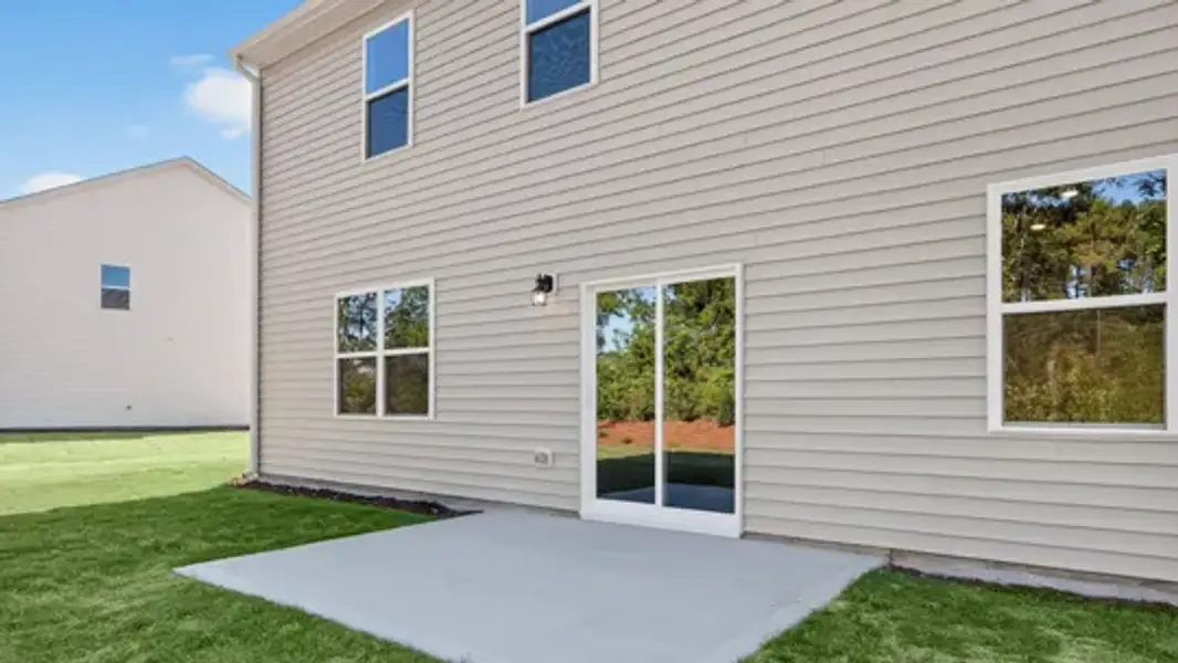 Exterior details and patio area of a home in Olive Branch, Wilson's Mills (Image 3).