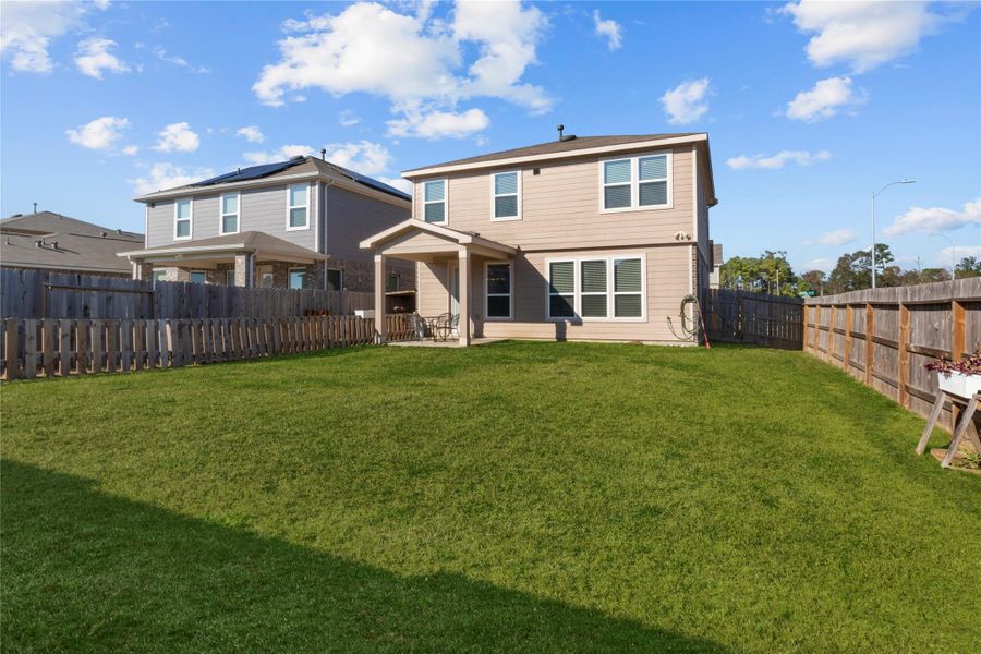 Exterior details and patio area of a home in , Houston (Image 2). Exterior details and patio area of a home in , Houston (Image 2).