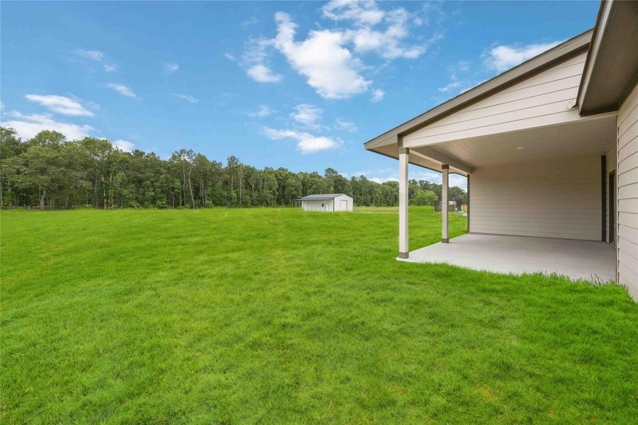 Overlooking a large acreage homesite, the possibilities are endless for you to create your dream backyard! Overlooking a large acreage homesite, the possibilities are endless for you to create your dream backyard!