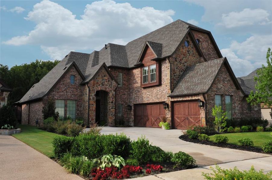 Representative exterior photo of a completed home built from the Franklin by Windmiller Custom Homes in The Highlands, Northlake, TX (Image 1). Representative exterior photo of a completed home built from the Franklin by Windmiller Custom Homes in The Highlands, Northlake, TX (Image 1).