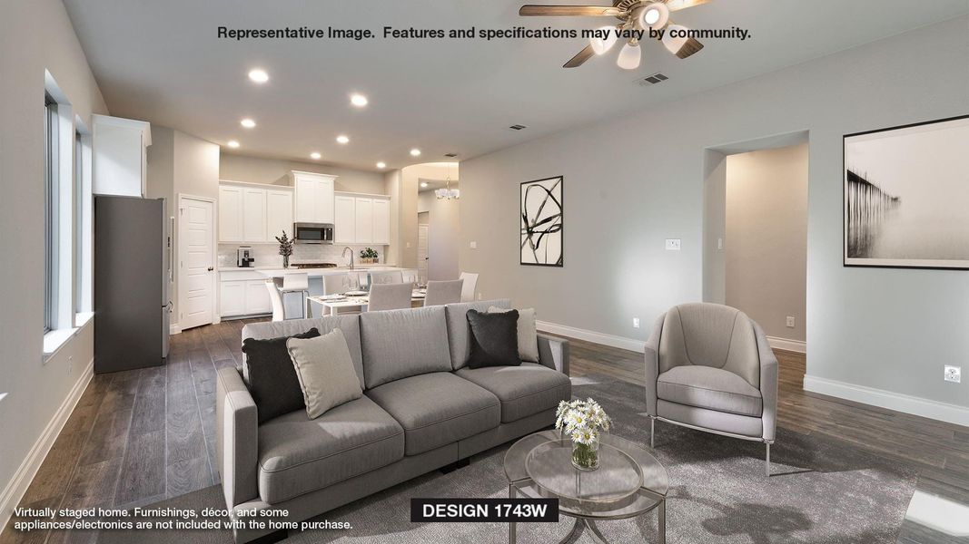 Living room featuring ceiling fan and dark hardwood / wood-style flooring