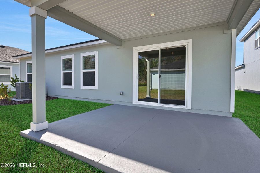 Exterior details and patio area of a home in Wilford Oaks, Orange Park (Image 29).