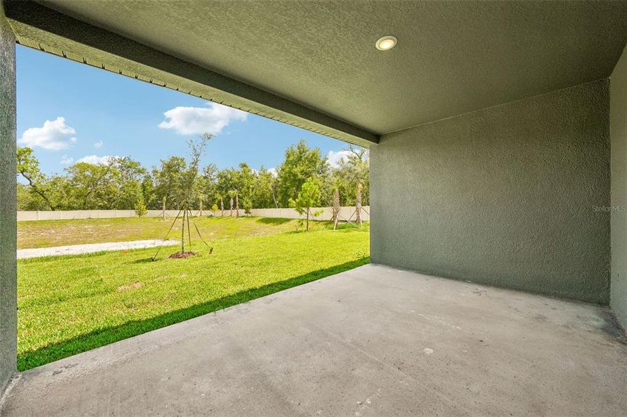 Exterior details and patio area of a home in Pine Ridge Meadows, Hudson (Image 26).