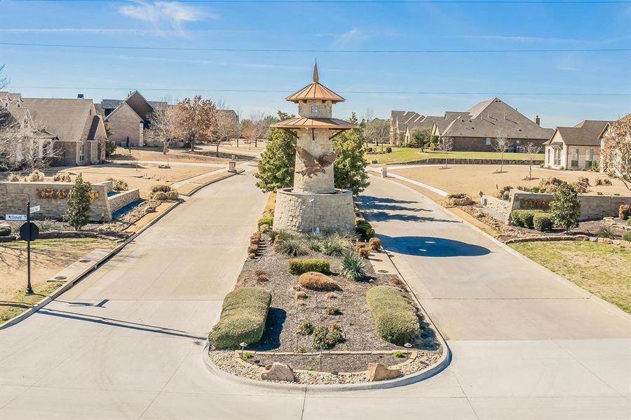 Entrance to the Falcon Point community in Heath, TX, featuring signage and landscaping (Image 2).