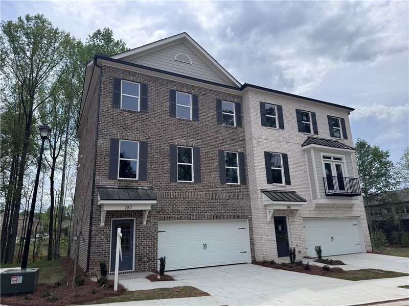 Front exterior of a new home in , Suwanee, GA, highlighting curb appeal (Image 2). Front exterior of a new home in , Suwanee, GA, highlighting curb appeal (Image 2).
