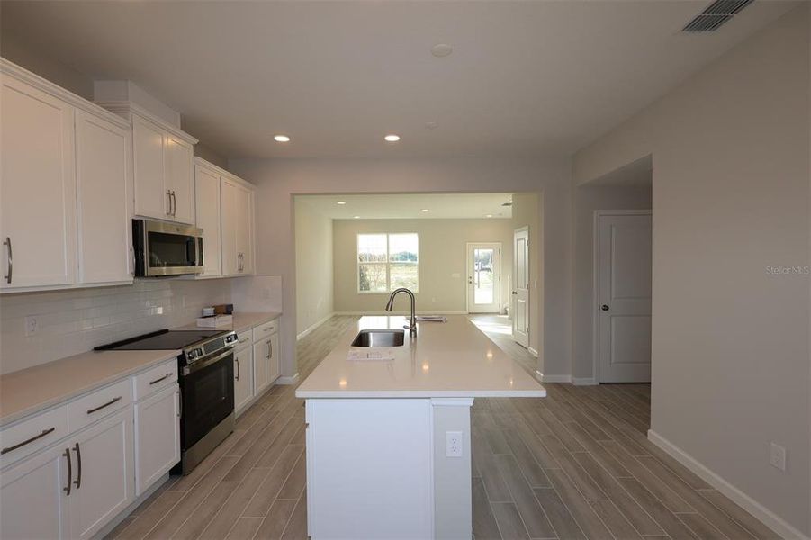 Furnished interior view inside a new home in Center Lake on the Park, St. Cloud (Image 11). Furnished interior view inside a new home in Center Lake on the Park, St. Cloud (Image 11).