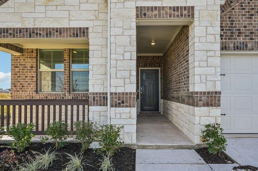 Exterior details and patio area of a home in Lakehaven - Premier Series, Farmersville (Image 4).