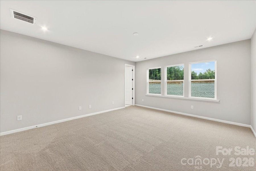 Light filled primary bedroom Light filled primary bedroom