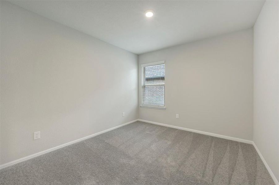 Spacious, unfurnished interior of a new home in Woodstone, Providence Village (Image 18).