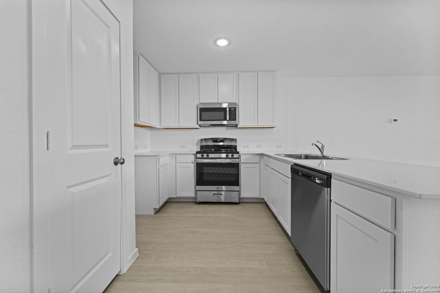 Furnished interior view inside a new home in , New Braunfels (Image 6).