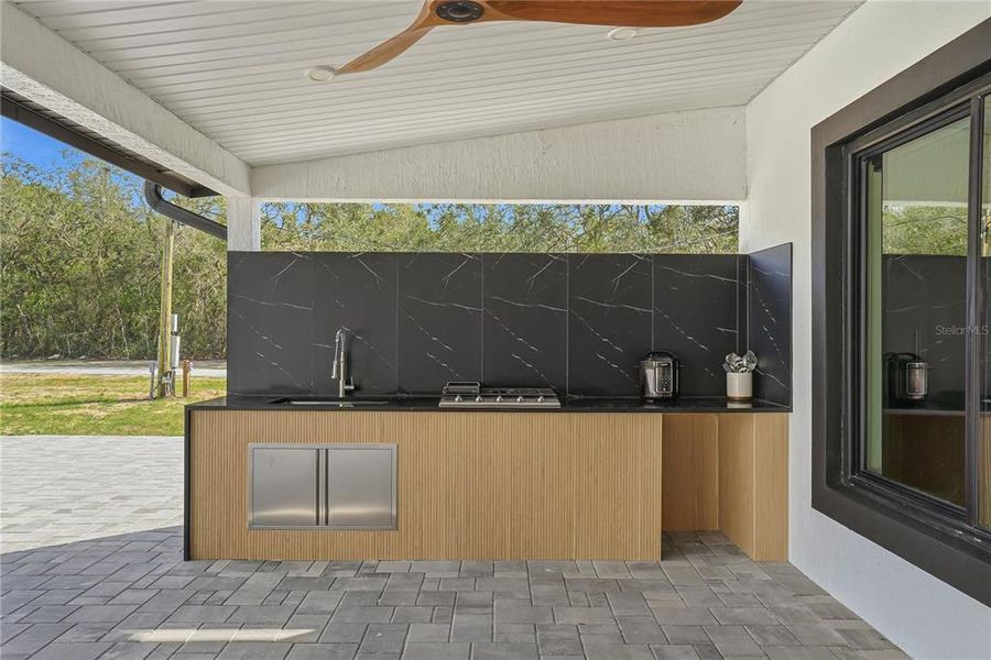 Exterior details and patio area of a home in , Spring Hill (Image 30).