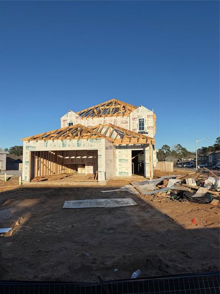 In-progress construction of a new home in River's Edge, Conroe, TX (Image 34).